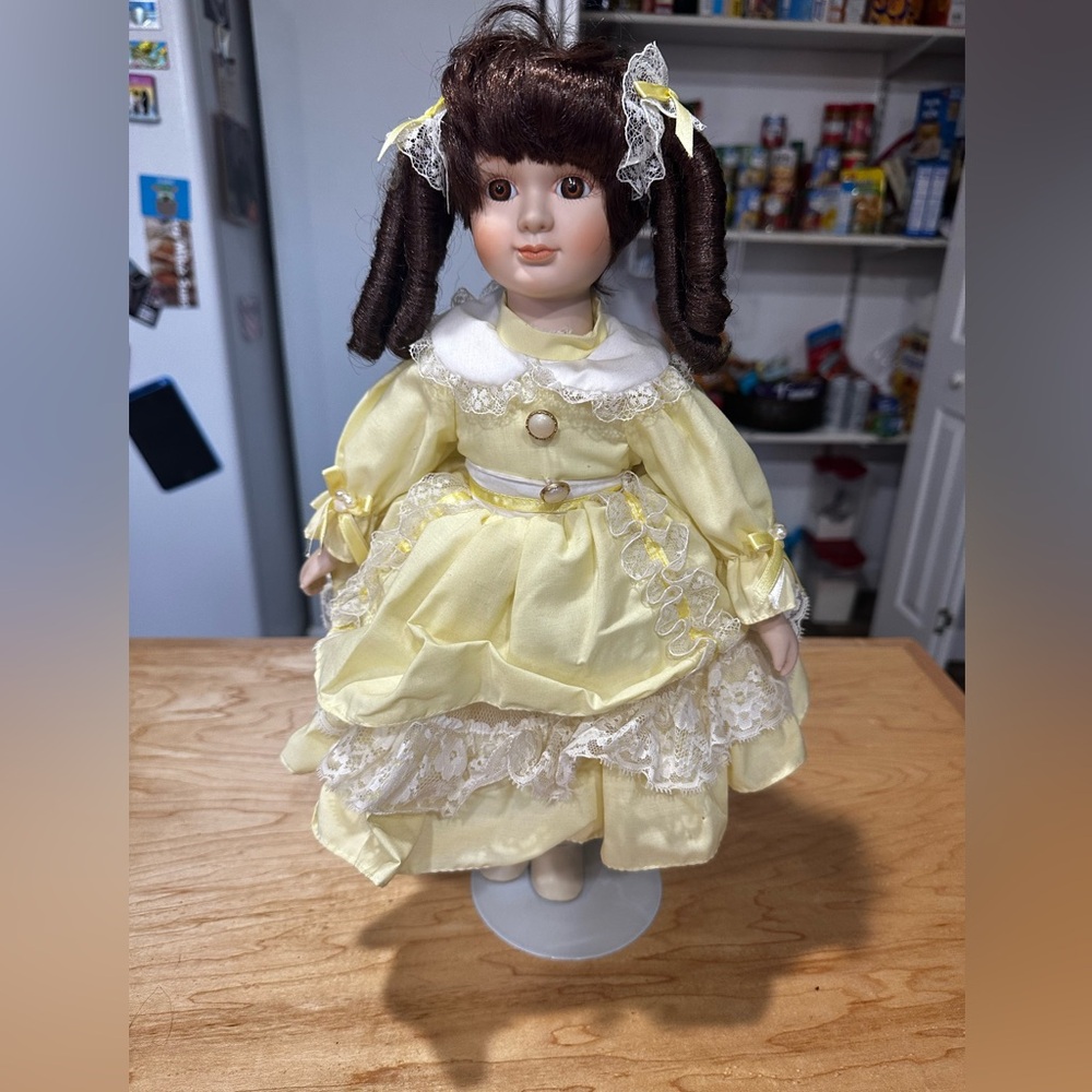 Brown Haired Porcelain Doll